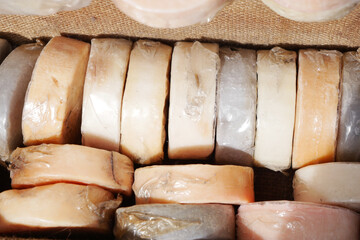 A delightful selection of assorted natural soap bars, featuring vibrant colors and diverse textures