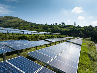 view of solar power station on green hill