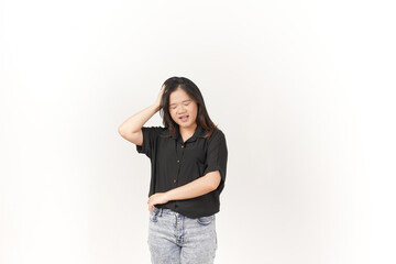 Young Asian woman suffering headache, hand on head wearing Black t-shirt and jeans isolated on white background