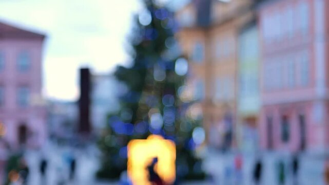 New Year and Christmas in Cheb, Czech Republic.out of focus.Christmas tree on the square of an old European town.Christmas town decoration. 4k footage