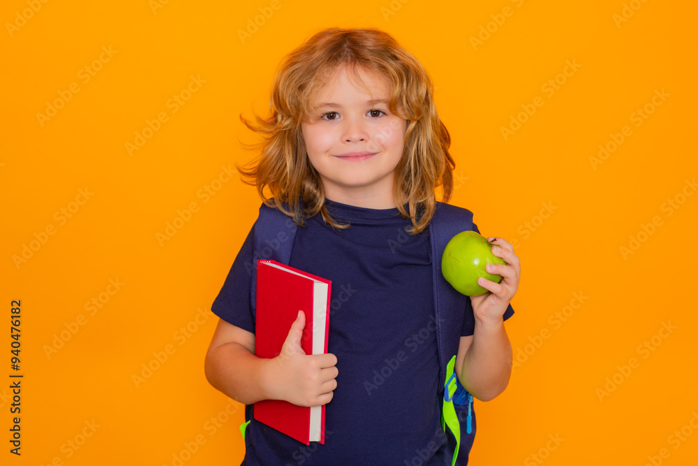 Poster school child from elementary school with book and apple isolated on yellow background. little studen
