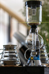Drip coffee is a brewing method where hot water is poured over ground coffee, allowing it to drip slowly through a filter into a vessel below. The process extracts the coffee's flavor