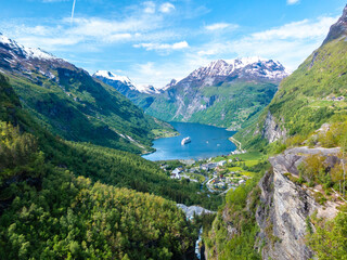 Geiranger leading into Gierangerfjord from the snowcapped Dalsnibba Pass mountain top viewpoint