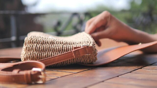  women taking smart phone our from her casual purse 