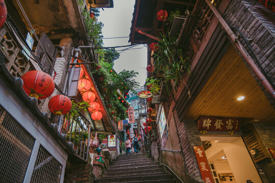 Jiufen Old Street is a narrow, winding alleyway with shops, teahouses, and restaurants that offers tourists a view of traditional Taiwanese life.