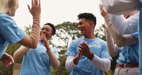 Hands together, volunteer and people in park applause for charity event, community service and teamwork. Volunteering, happy and men and women celebrate for donation, ngo programme and outreach