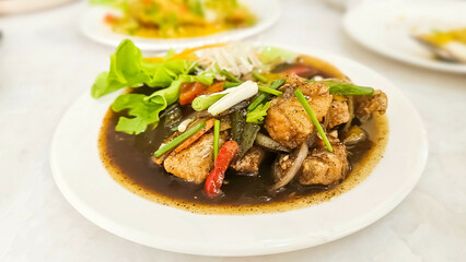 Stir-Fried Sea Bass with Chinese Celery and Black Pepper.