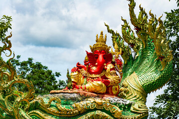 Close-up of the red Ganesha, beliefs and faith of Indians.