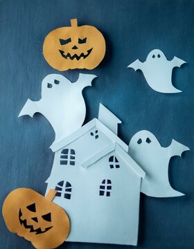 Cheerful ghosts and carved pumpkins surround a crooked house on a dark blue background. Perfect for playful Halloween blog graphics, festive social media posts, and themed party invites.