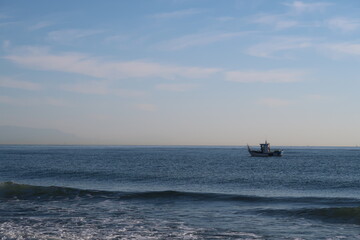 Obraz premium Boat on the ocean