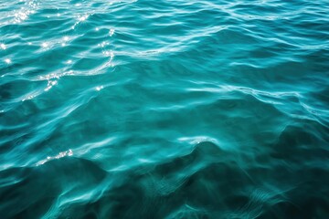 Blue green surface of the ocean in Catalina Island California with gentle ripples on the surface and light refracting , ai