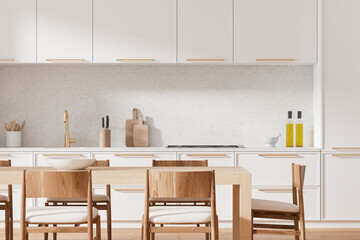 Classsical home kitchen interior with dining table and cabinet, closeup