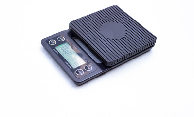 Black coffee scale with four control buttons