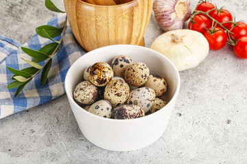 Raw quail eggs in the bowl
