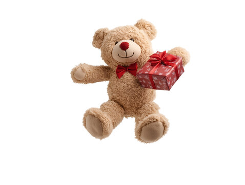Naklejki photo of a soft cotton teddy bear holding a christmas gift floating in mid-air on isolated background 