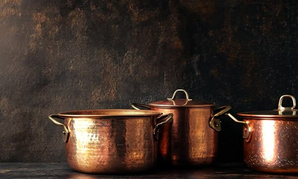 Copper Pots on a Dark Background