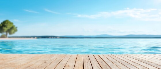 Fototapeta premium A wooden deck by a body of water Palm tree on opposite shore Beach in background