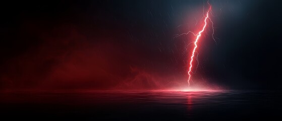 Lightning bolt in night sky above water Background is black