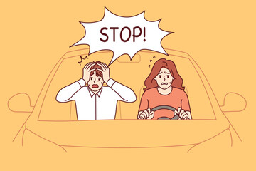 Woman drives car poorly, sitting behind wheel and frightening man who clutches head in fear. Girl violates traffic rules and drives car without drivers license for completing course.