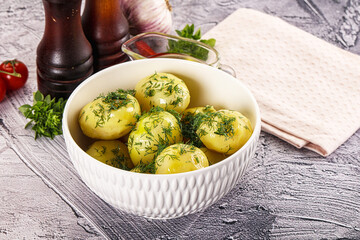 Young boiled potato with dill