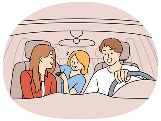 Happy family with child in car