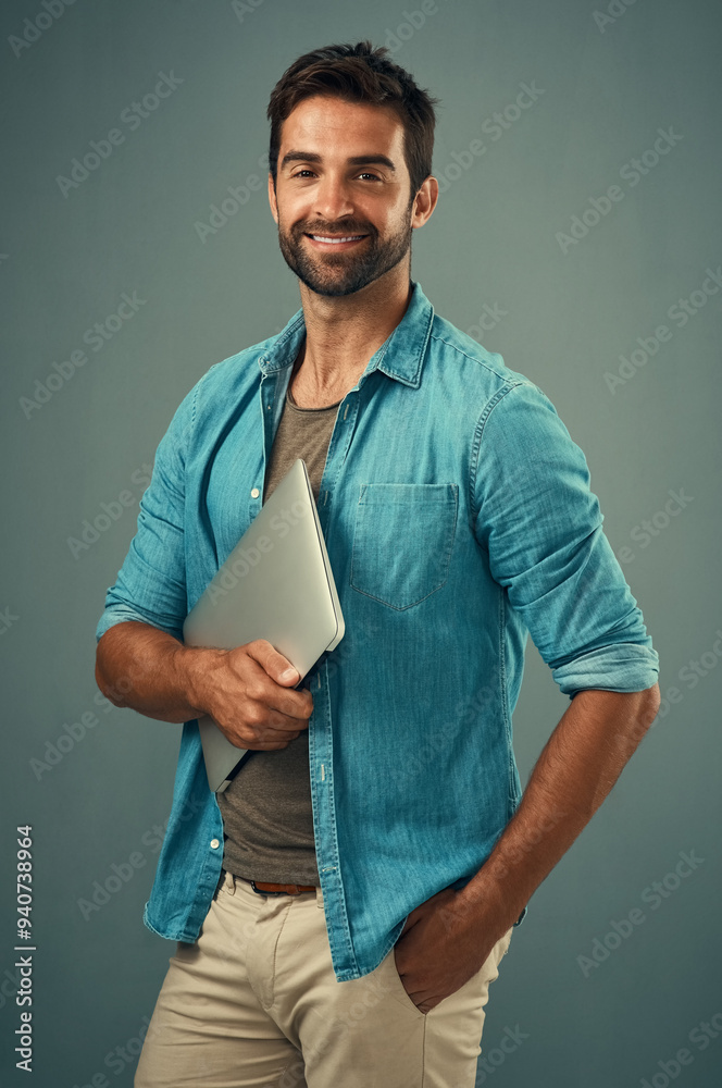 Poster studio, portrait and businessman with laptop for research, planning and access information on intern