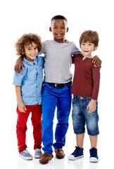 Fototapeta premium Kids, fashion and portrait of boys in studio with smile, bonding or diversity on fun weekend together. Growth, friends and happy children with cool style, trendy clothes and hug on white background