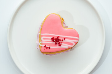 dessert in a clear glass with berries, cream and chocolate