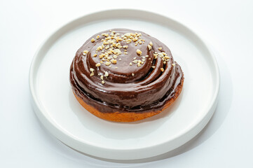 dessert in a clear glass with berries, cream and chocolate