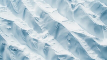 Obraz premium Arctic Mountain Snow Texture, Captivating closeup of pristine snow covering rugged mountain peaks, showcasing the serene beauty of the polar landscape in winter.