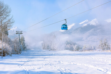 Ski resort Bansko, Bulgaria, cable car and slope