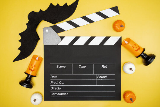 Halloween movie decorations, blackboard scene, scary cinema clapperboard.