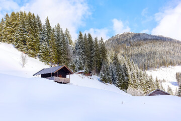 Winter snow landscape, hut in Austria
