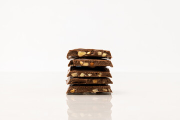 stack of chocolate bar with cashew nuts, isolated on white background
