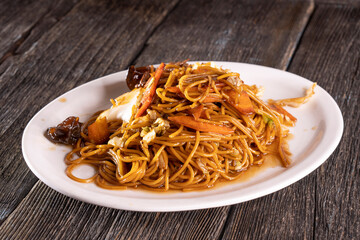 Shallot Chili Oil Noodles on a wooden background. Food concept. Chinese food.