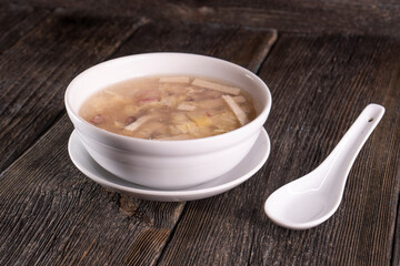 Chinese Tofu Vegetable Soup on wood table. Chinese food.