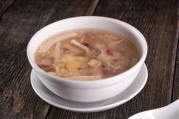 Chinese Tofu Vegetable Soup on wood table. Chinese food.