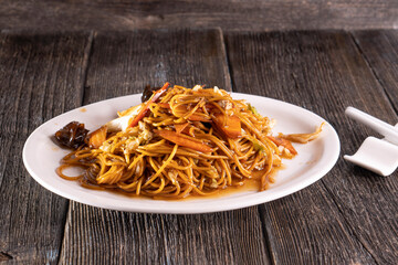 Shallot Chili Oil Noodles on a wooden background. Food concept. Chinese food.