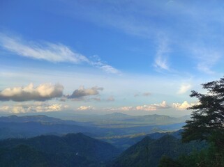 Fototapeta premium clouds over the mountains in in Indonesia 