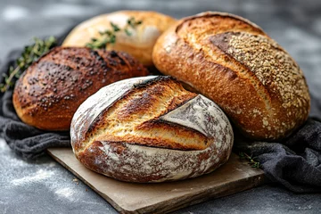 Rollo Brot Artisanal bread with flour dust, backlit by warm sunlight in a rustic bakery.. Freshly baked bread in bakery shop, closeup.   © Anahit
