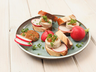 White sausage with sweet mustard and pretzel served as finger food
