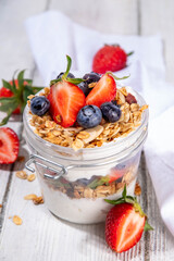 Summer berries granola breakfast layered dessert