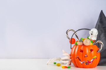 Pumpkin bucket with halloween candy