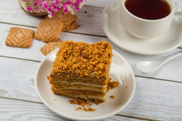 Homemade cake on a light table. Sweet breakfast