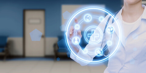 Female doctor hand using glowing round medical hologram on blurry office background with mock up place. Healthcare concept. Double exposure.