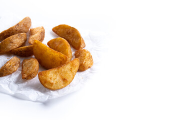 Fried potato wedges isolated on white background. Copy space