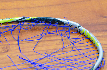 broken badminton racket  broken rim