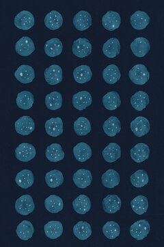 Abstract background made of blue watercolor circles forming a regular pattern