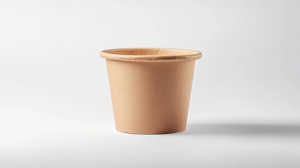 Eco-friendly packaging solution: Disposable ice cream bucket or food bowl crafted from kraft paper, featuring a brown cardboard texture.