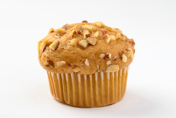 Vanilla almond muffin on white background